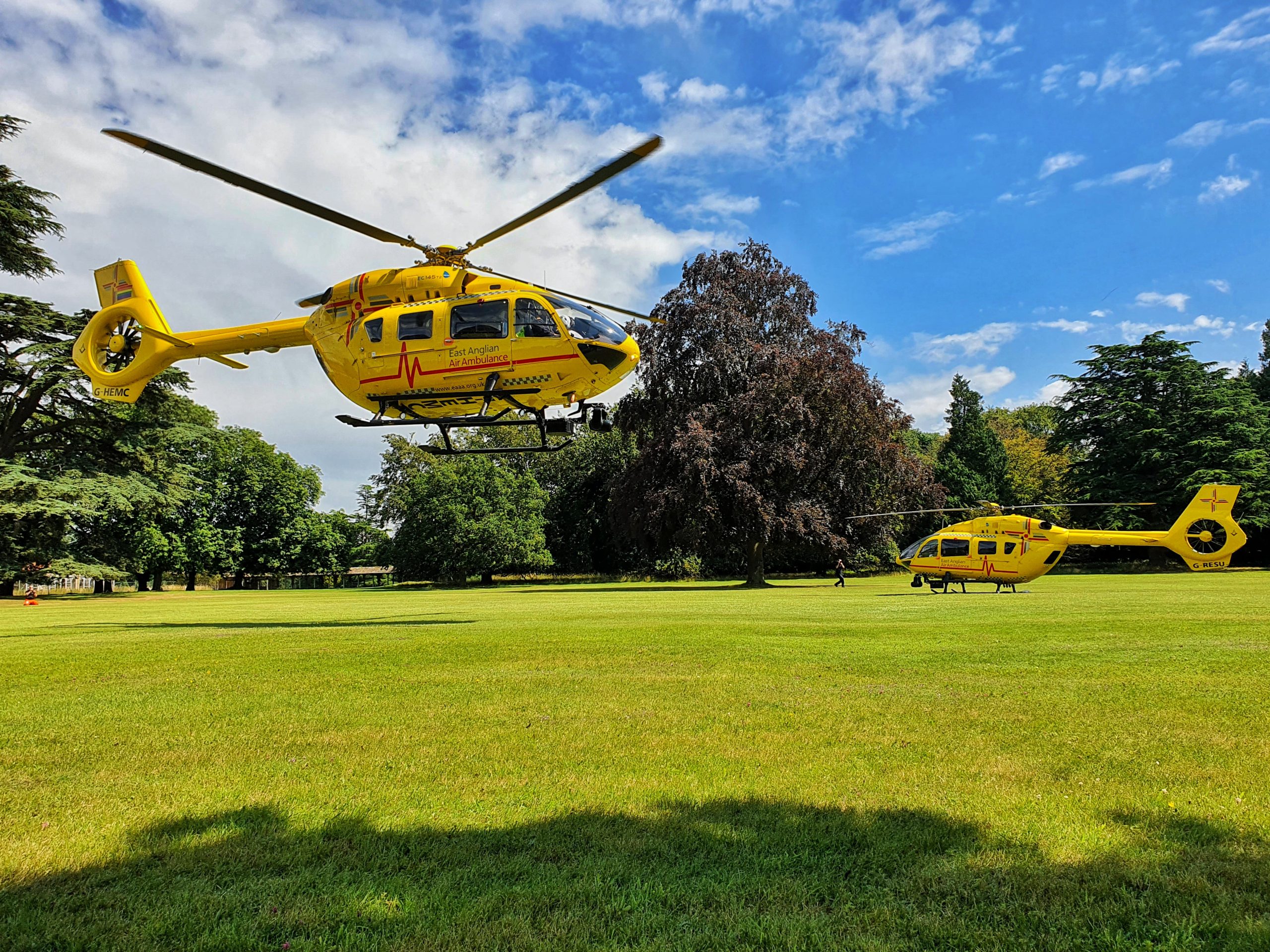 helicopters landing on grass