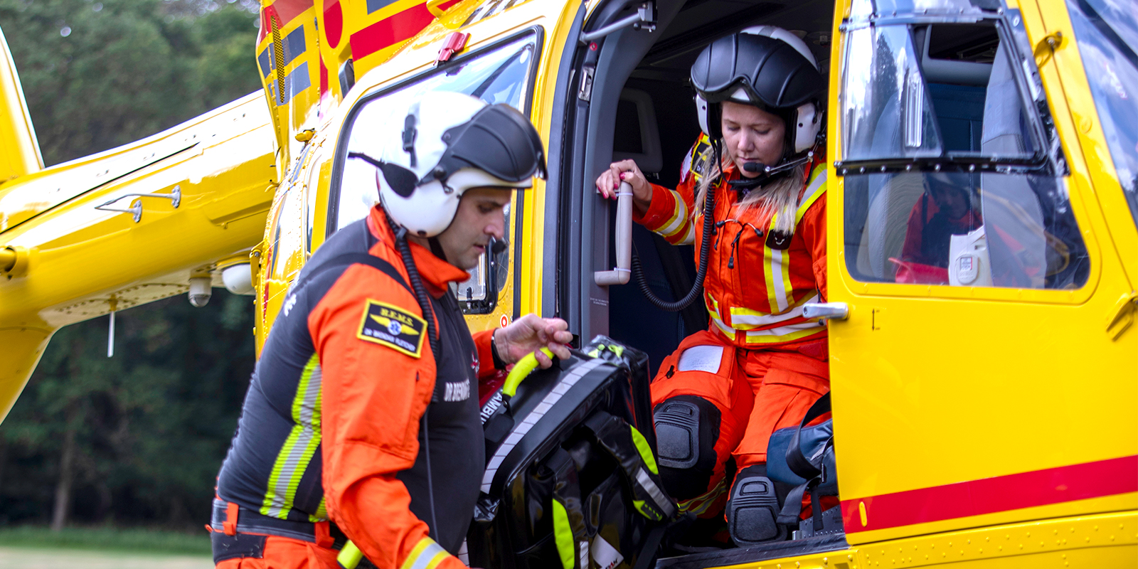 Crew disembark helicopter