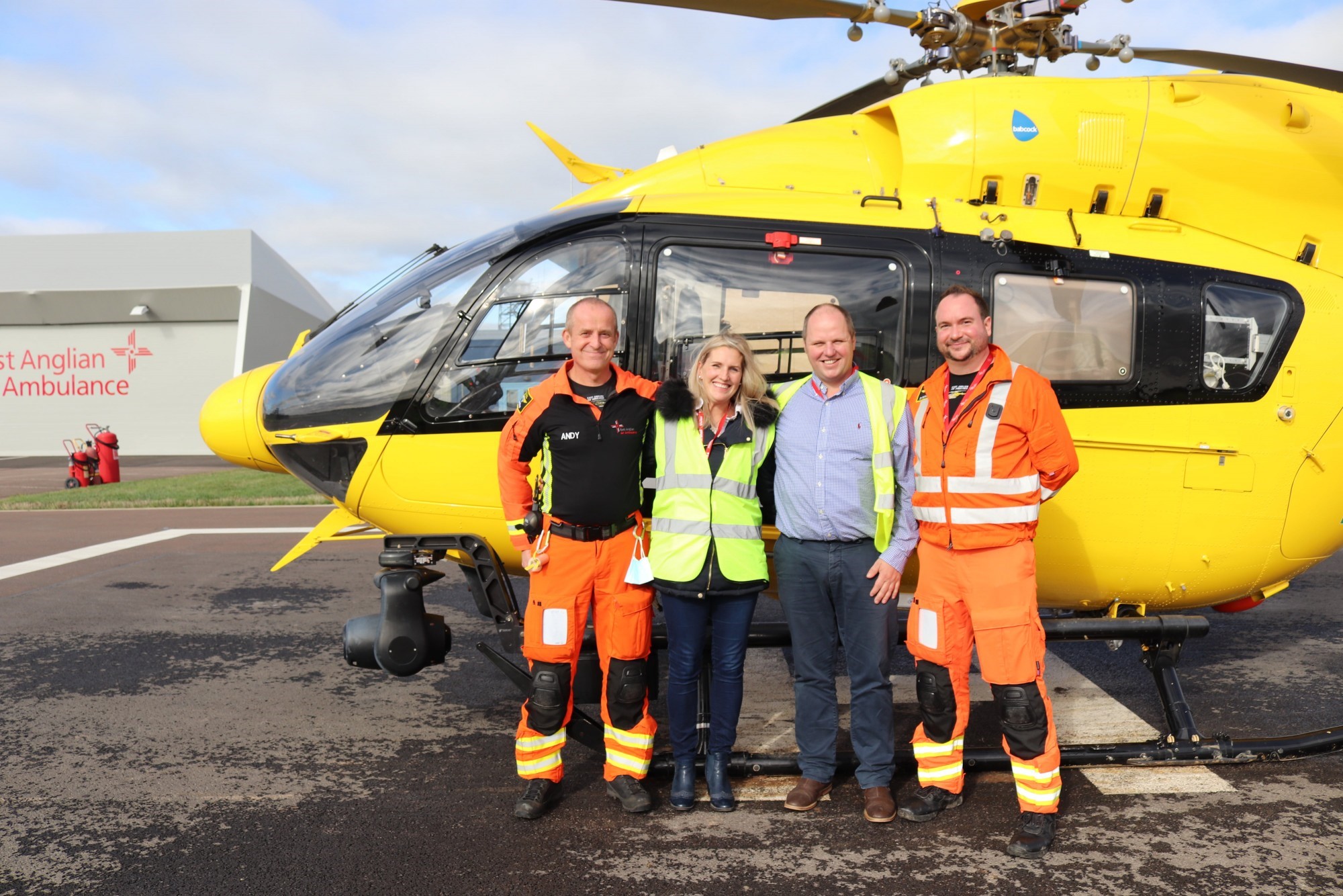 Jonathan and Wendy Willis and EAAA crew. Standing in front of the helicopter. 