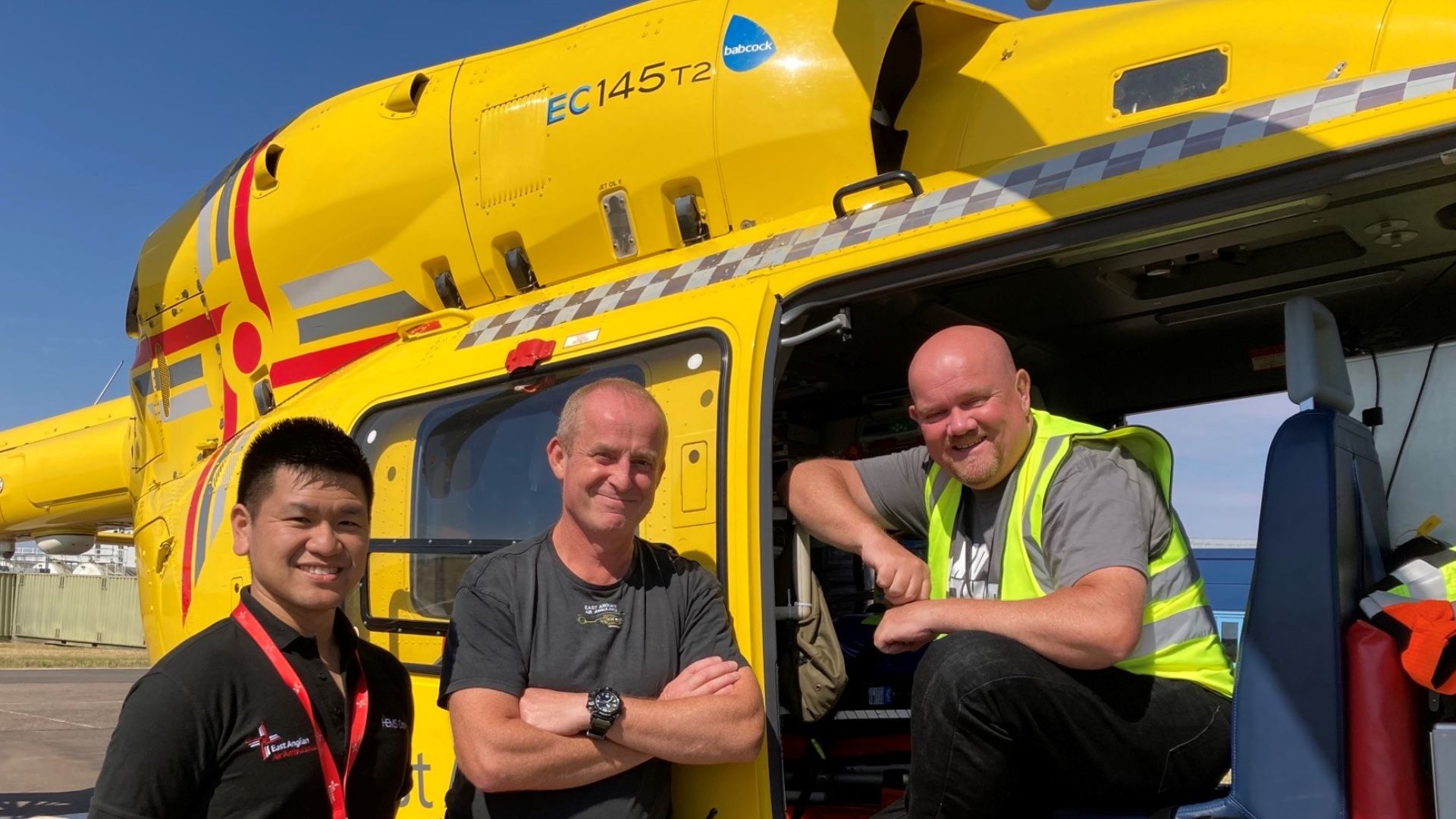 Keith Pocock in the EAAA helicopter with EAAA clinicians during a visit.