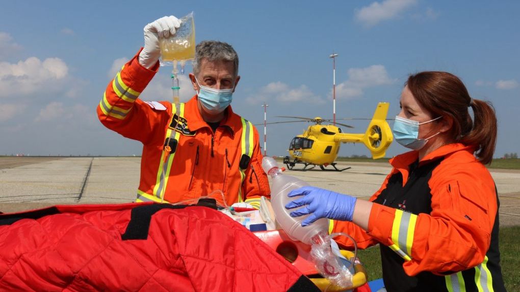 Crew administering blood products