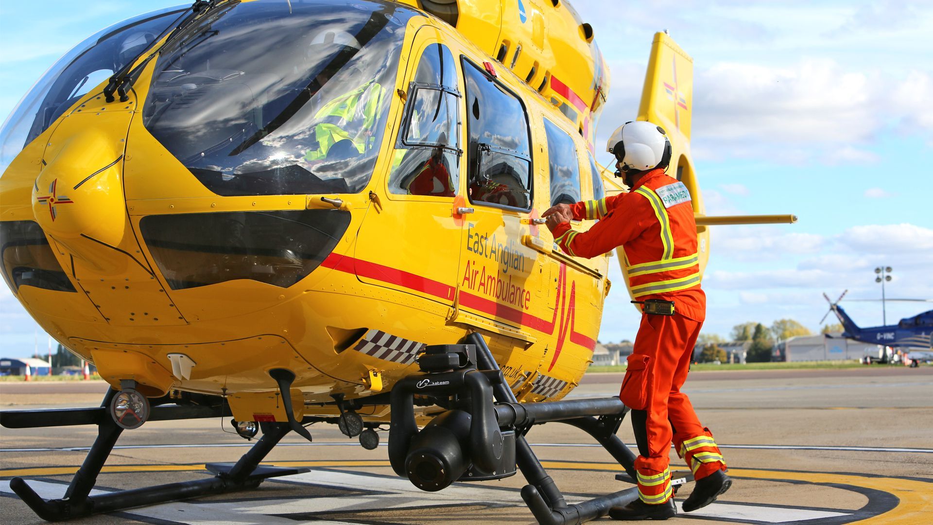 Critical Care Paramedic opens Air Ambulance Helcopter door