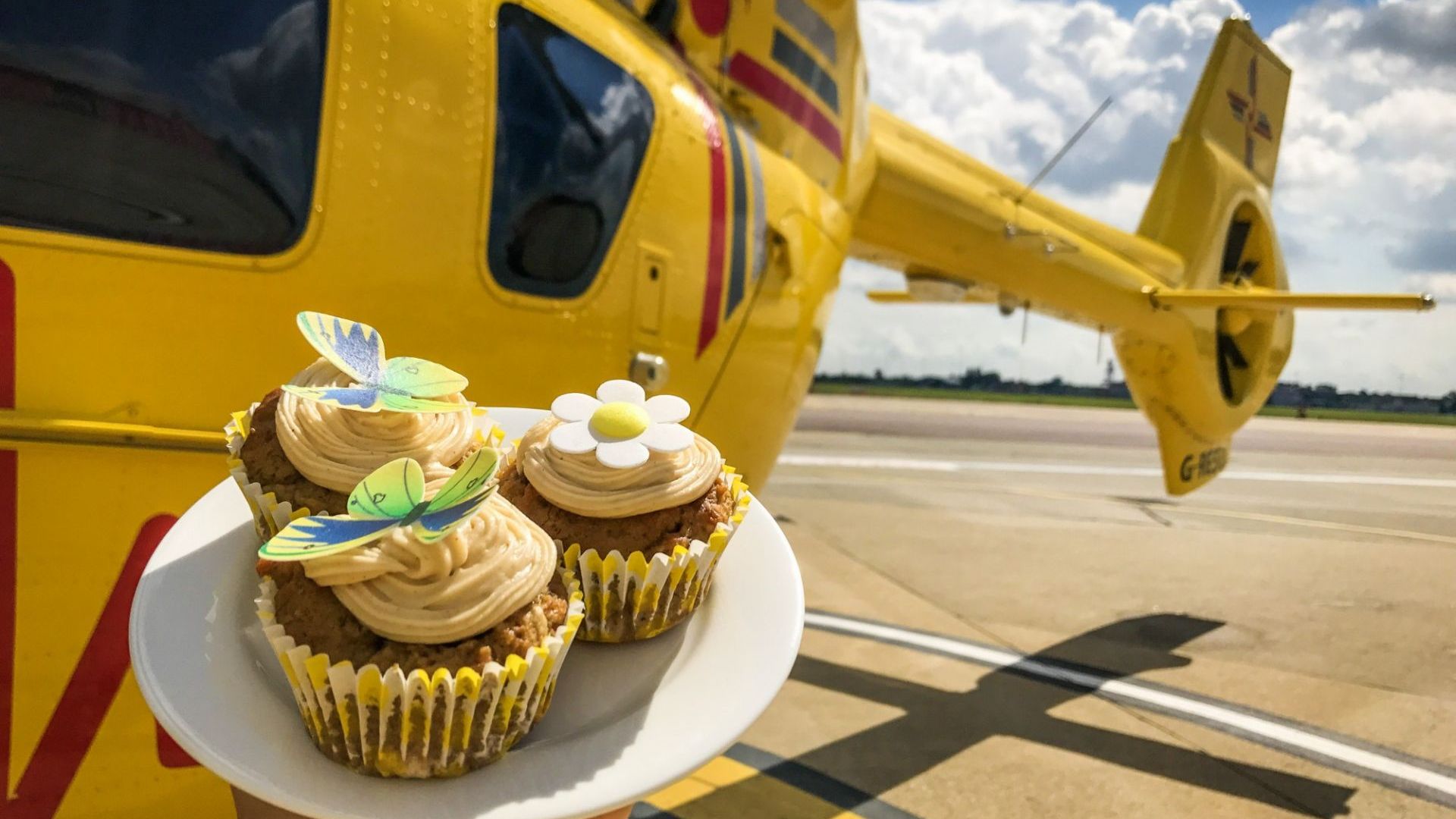 Cupcakes with East anglian air Ambulance helicopter