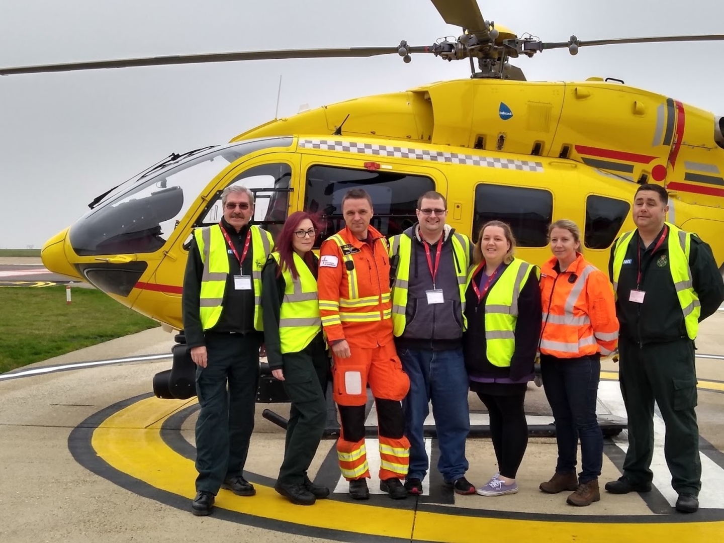 Steve Jones and family with the EAAA and EEAST crew in front of the helicopter.