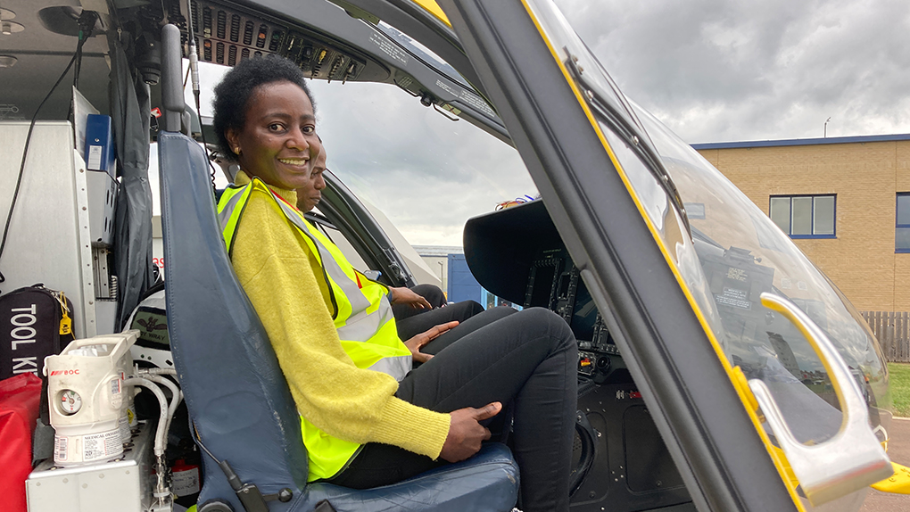 Tope sitting in the EAAA helicopter.