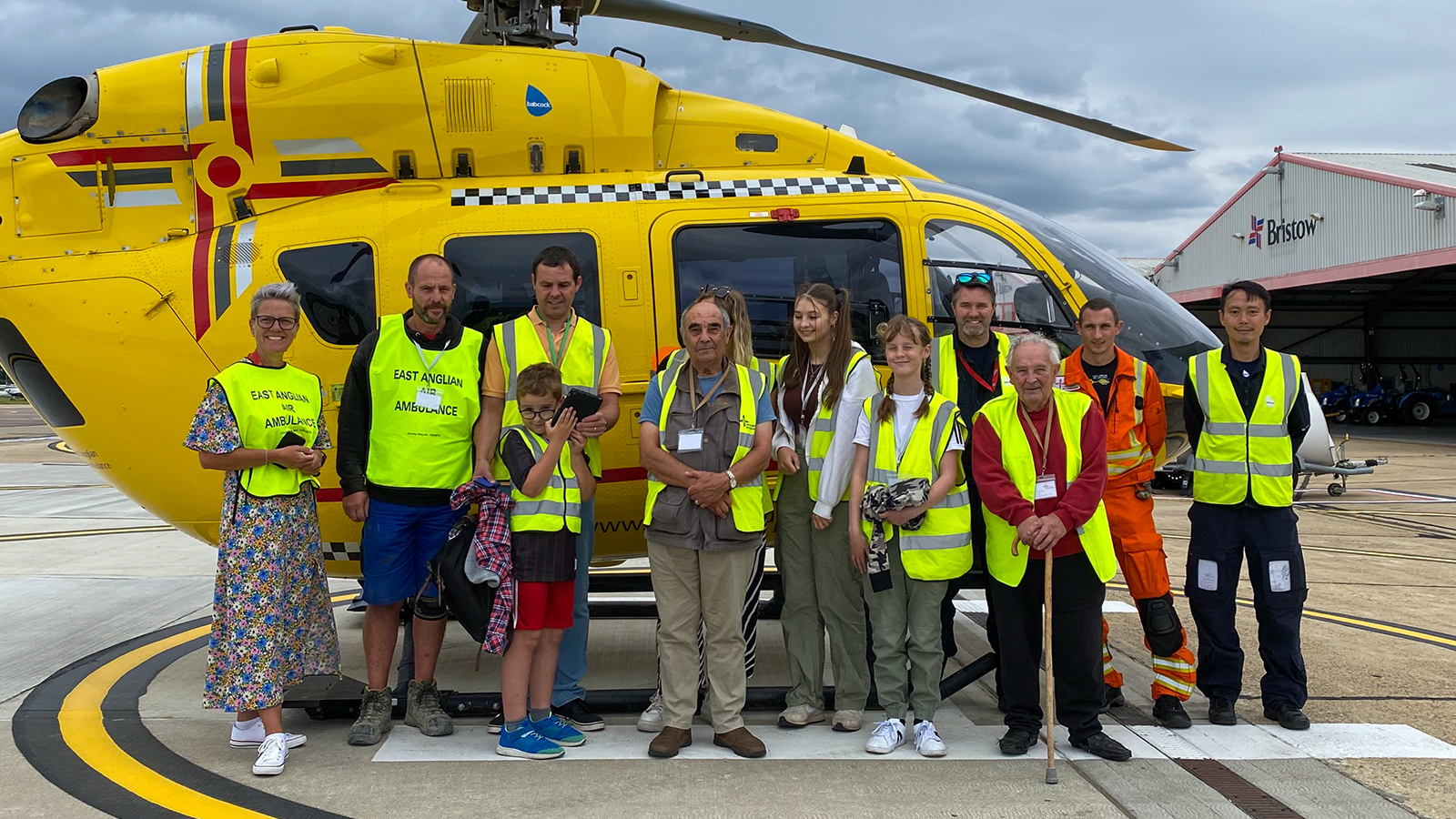 Bruce and family in front of helicopter