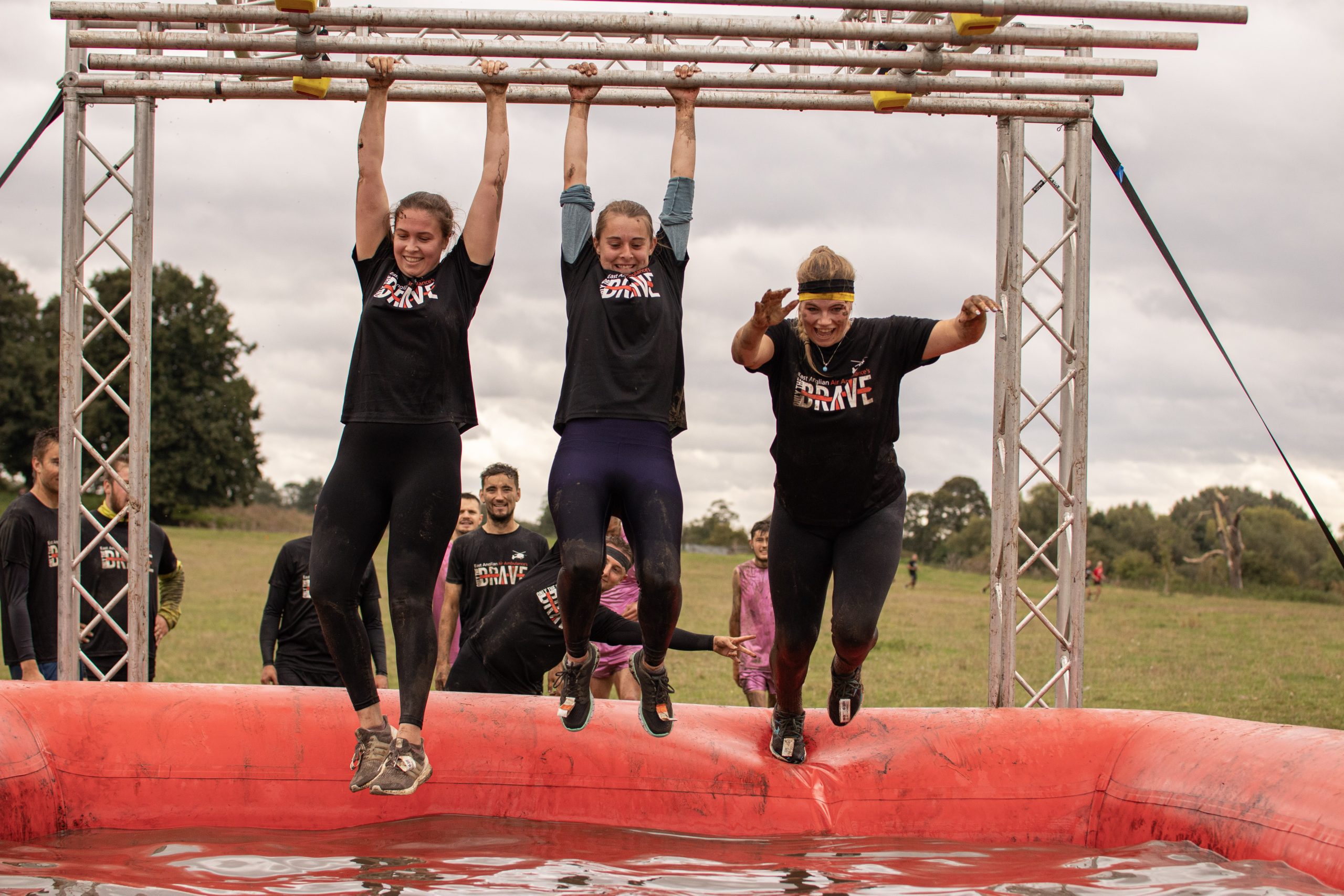 3 women on the Only the Brave Monkey Bars