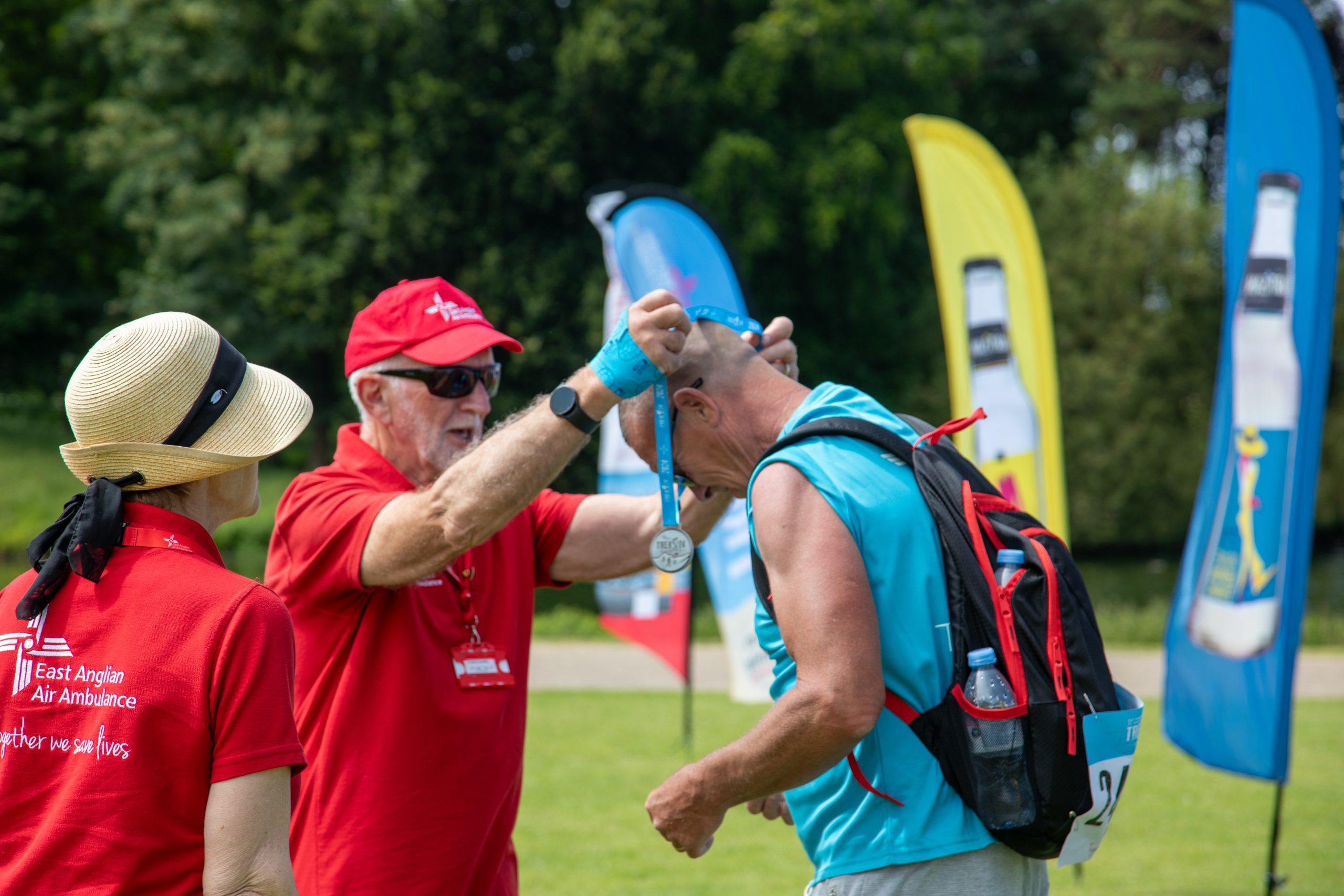 Trek 24 Norfolk- Man receiving medal