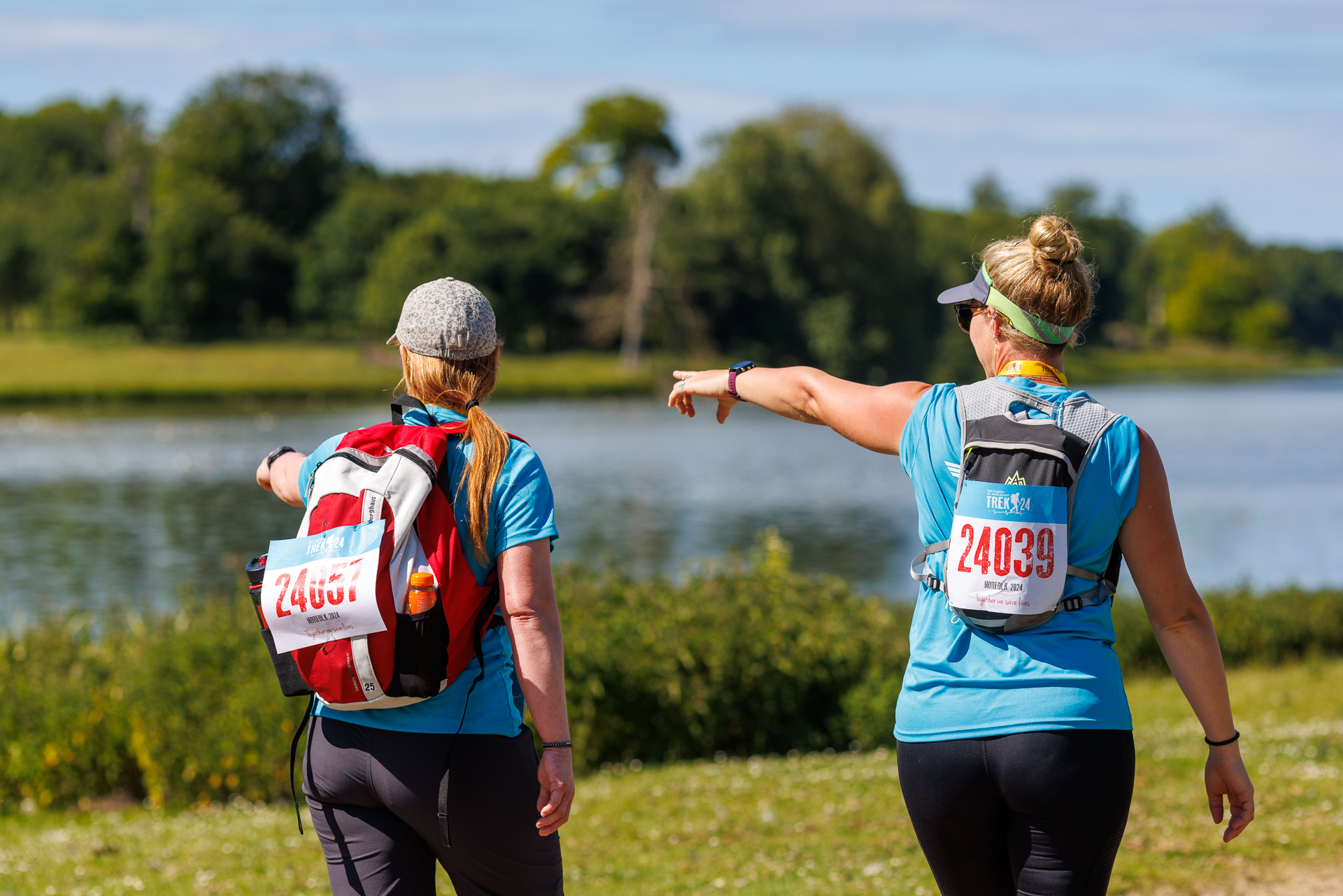 Trek 24 Norfolk- two people from behind pointing