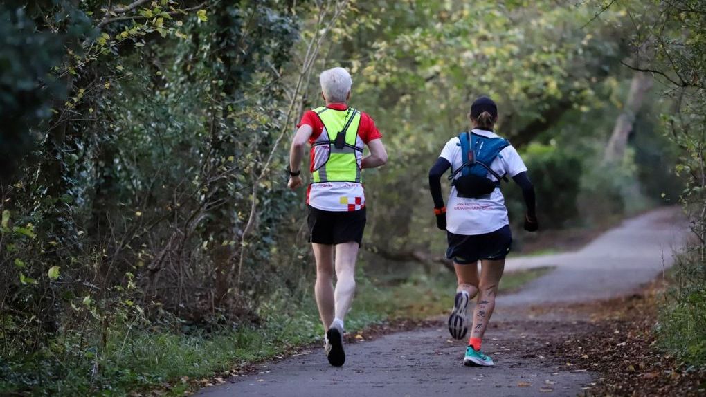 EAAA CEO Matthew Jones running with former patient Laura Bird