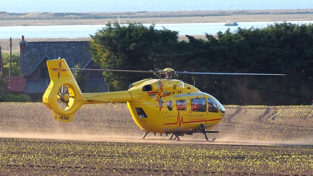 helicopter landing in field